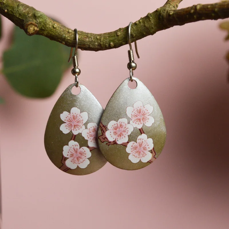 - Cat hair ball removal and hair removal creamCherry Blossom Dangle Earrings